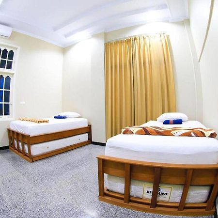 Sentosa Lodge Паданг Экстерьер фото