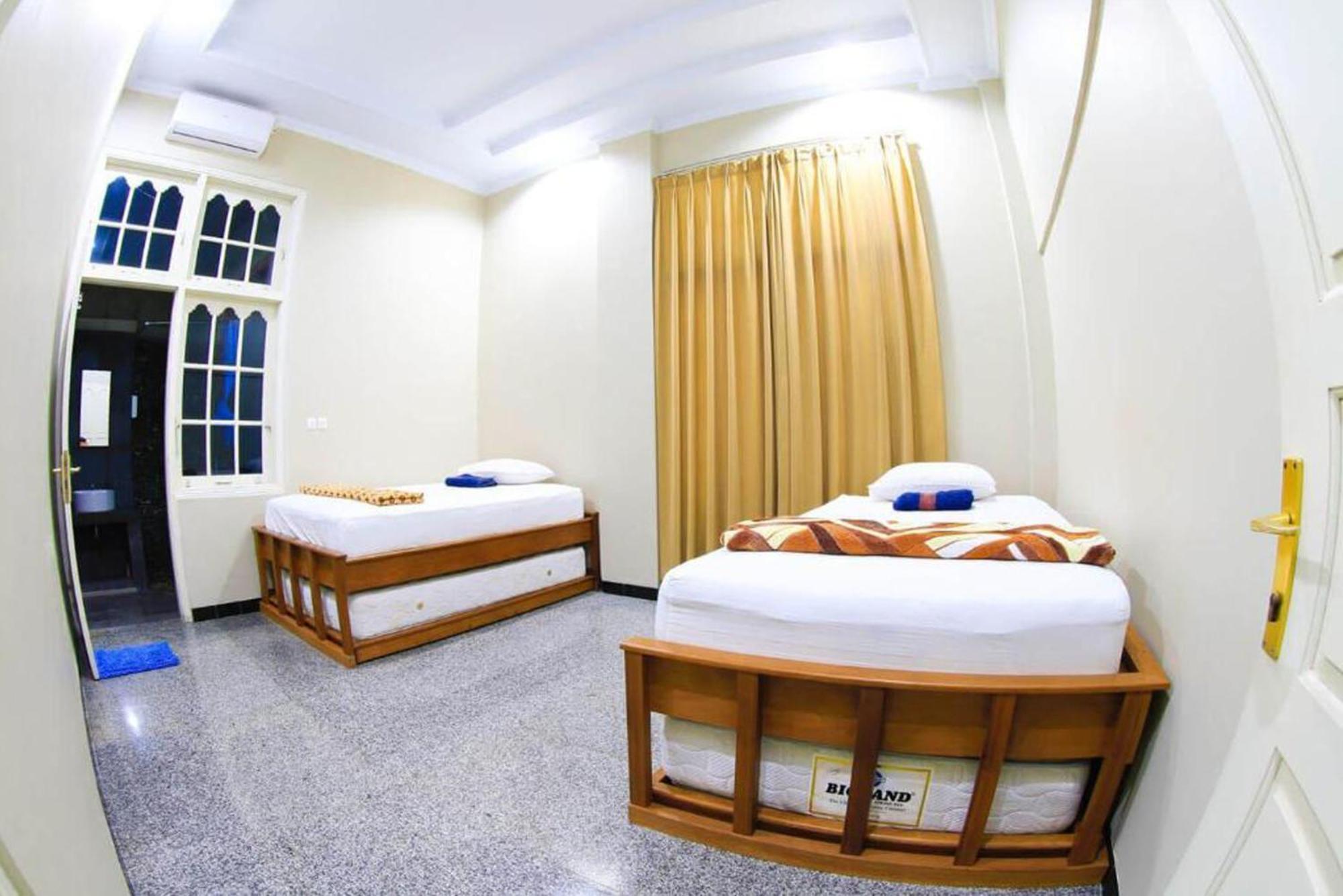 Sentosa Lodge Паданг Экстерьер фото